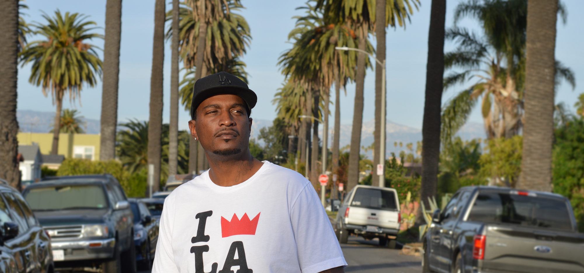 Man wearing an LA themed t-shirt from the Nuthin' But a Tee Thang store
